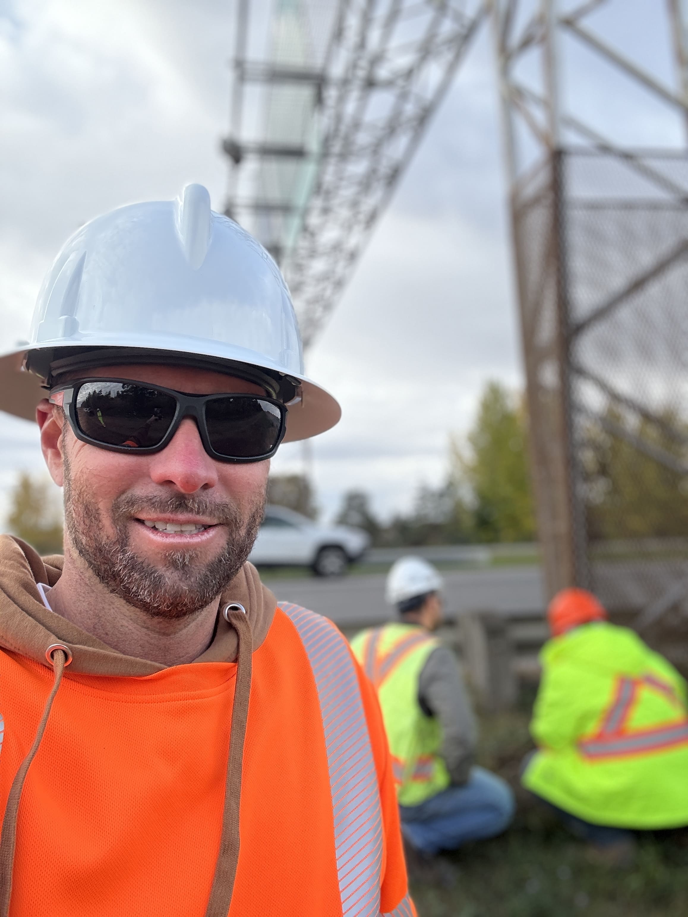 Field crew review of inspection findings and site access.