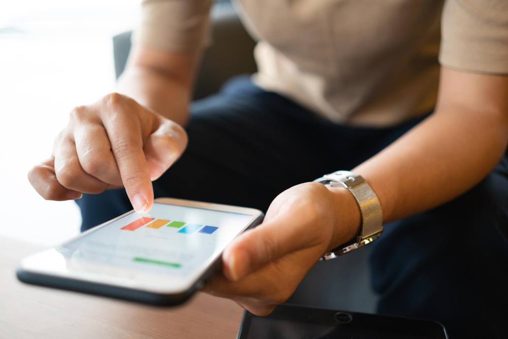 ipad and someone typing for marketers