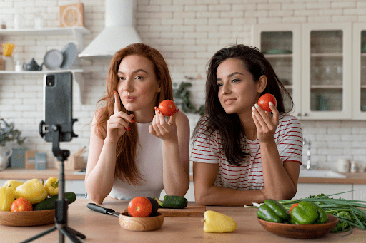 tripod girl showing tomatoes
