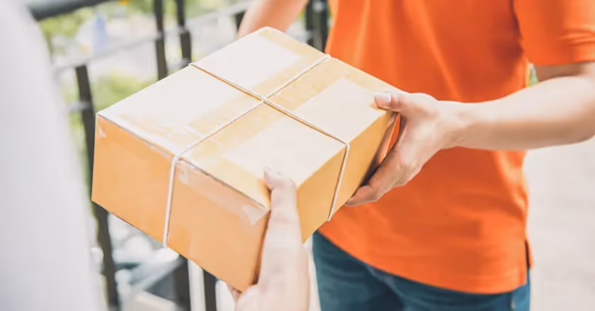 package being handed to someone