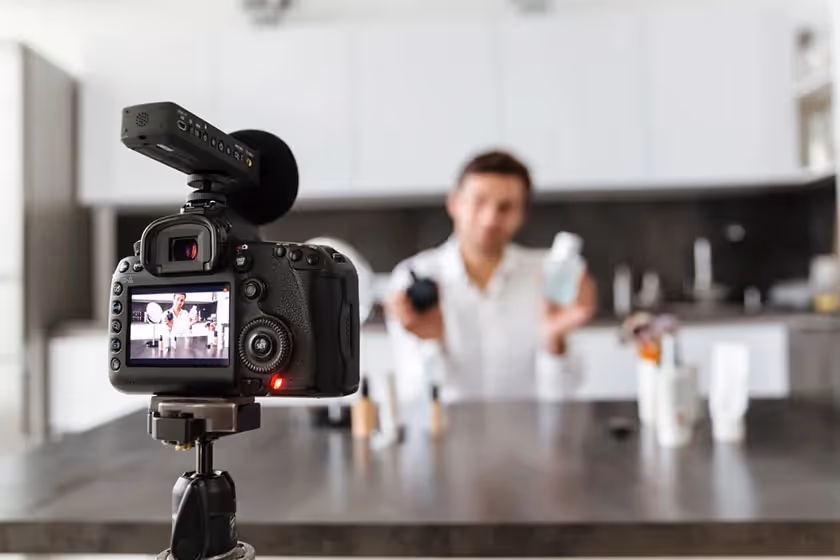person filming product content