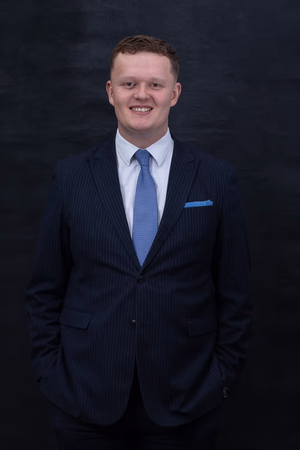 Holborn Adams Paralegal Michael Rutherford in business suit