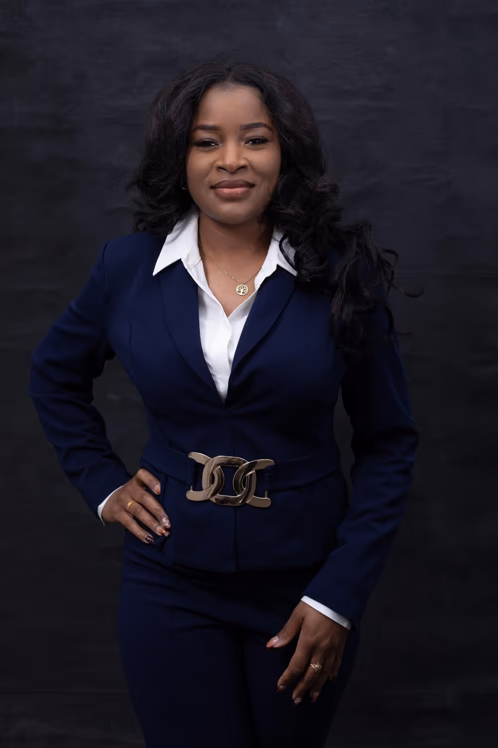 Holborn Adams Paralegal Onika Cadette in professional attire