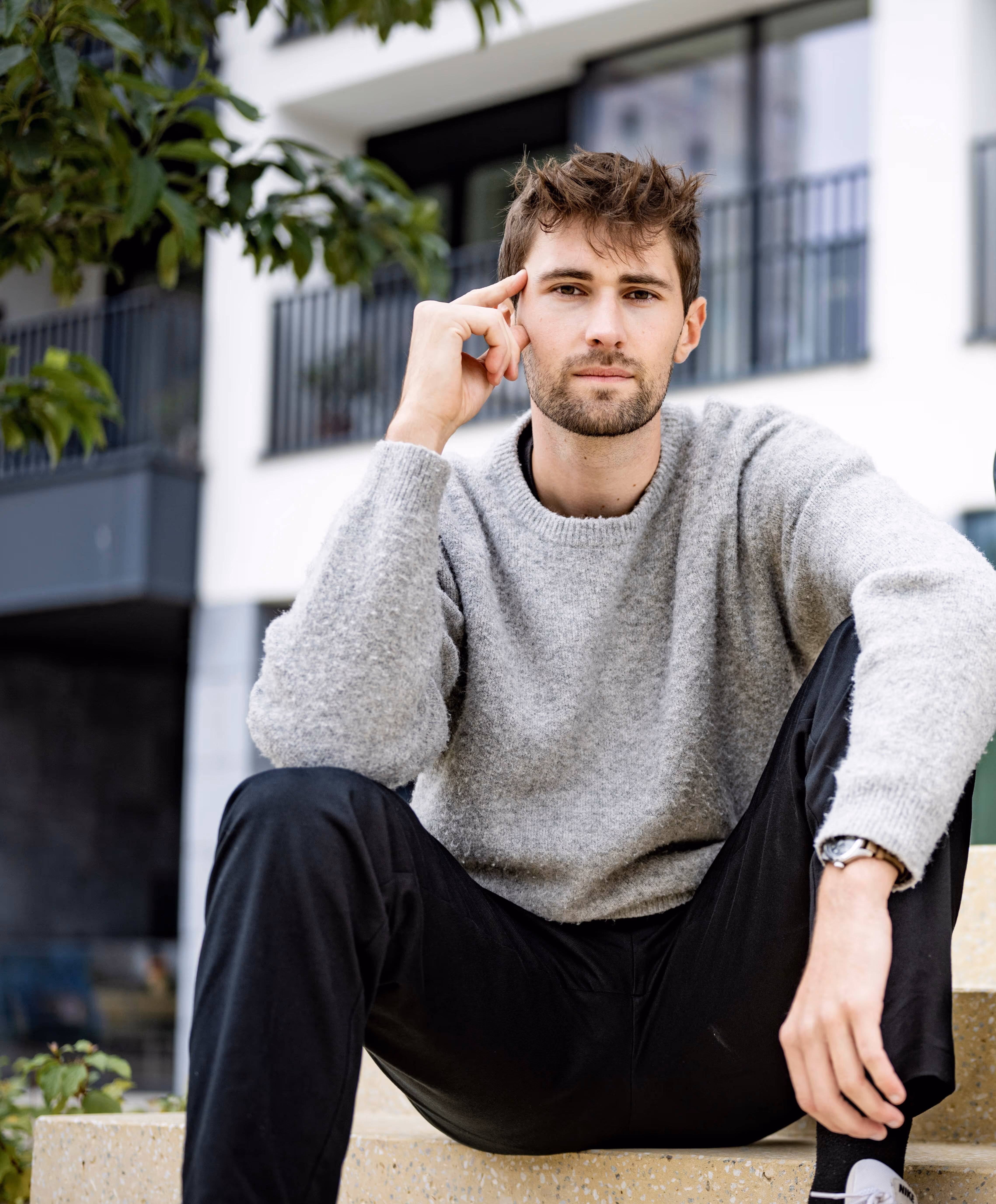 a man sitting on a bench