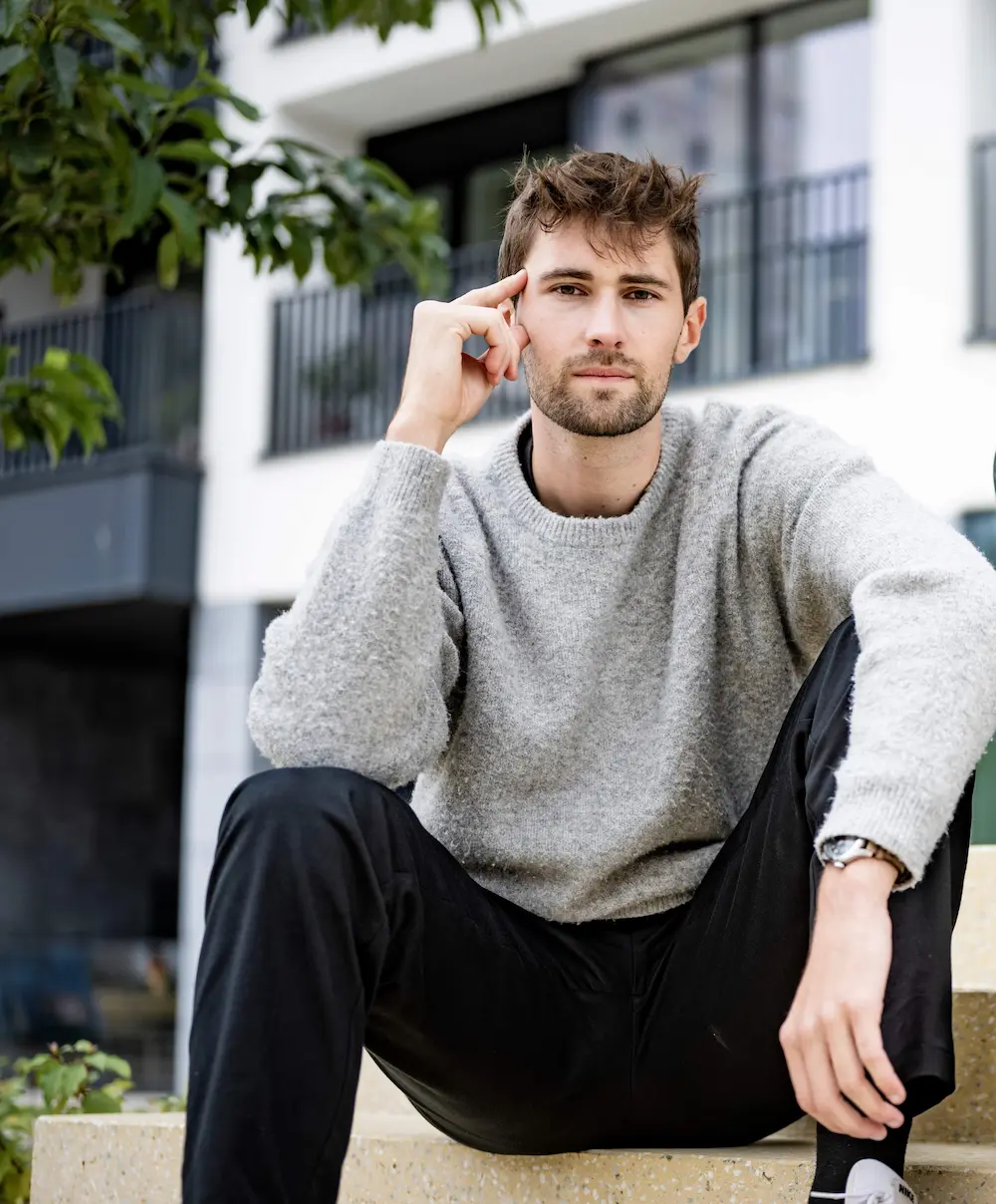 a man sitting on a bench
