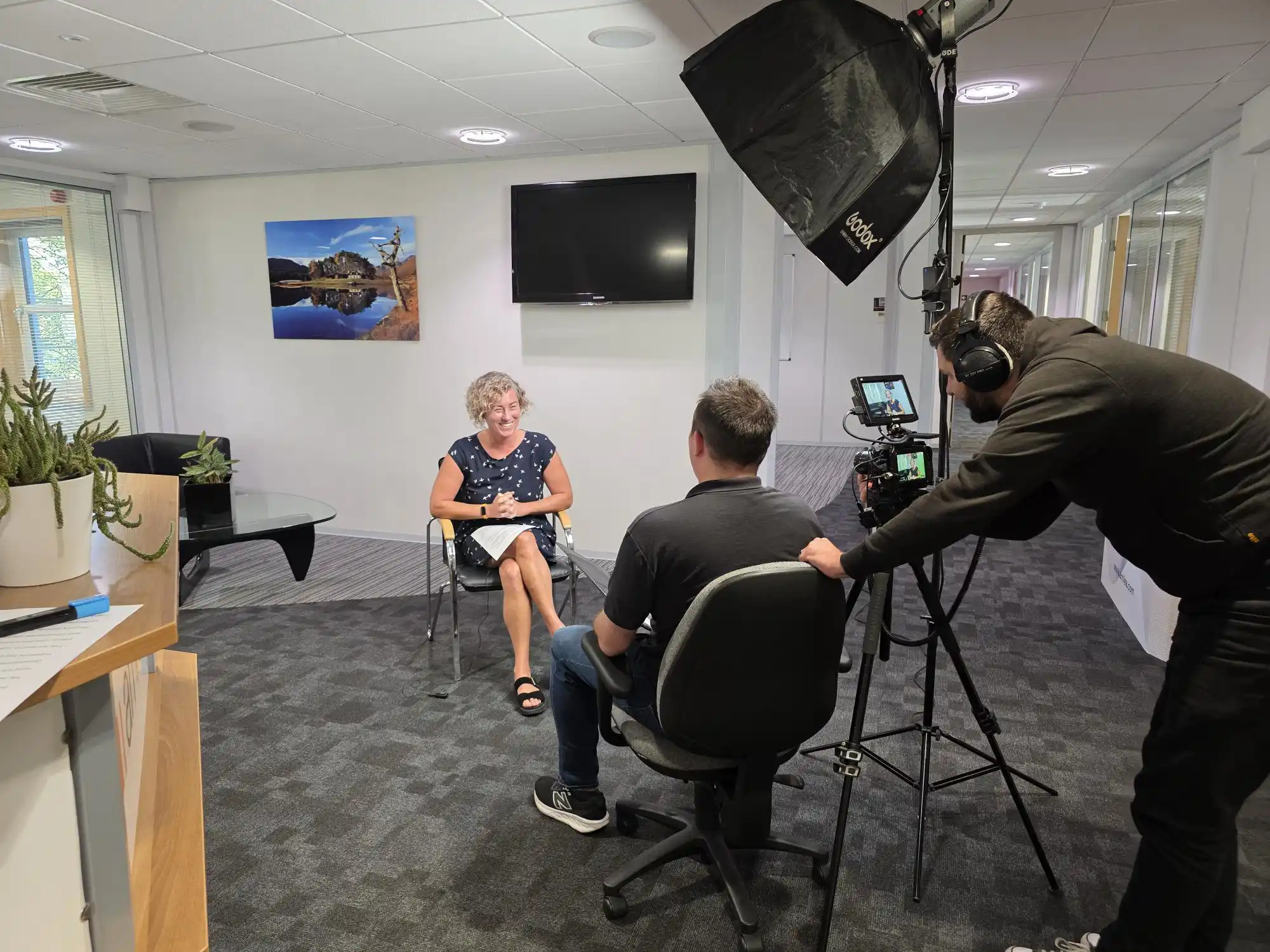 Farsight film crew interviewing Arnlea’s senior management team in the office, with professional lighting and camera setup capturing behind-the-scenes footage.