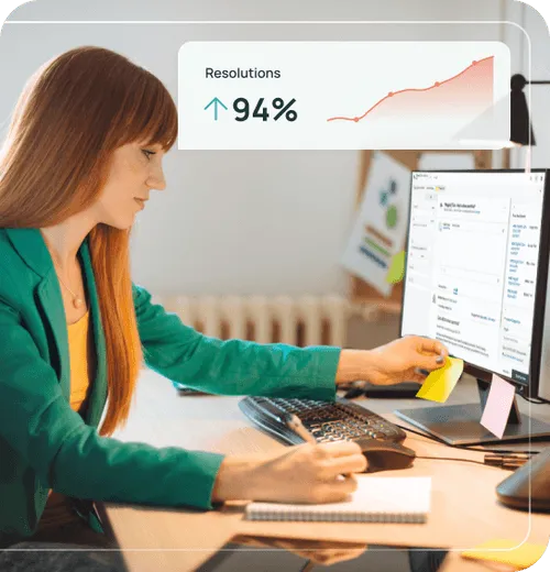 Woman in green blazer working at a desk with computer and notepad, showing a screen graphic of 94% resolutions with an upward trend.