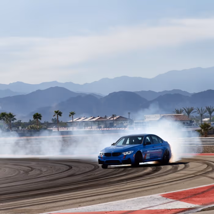 BMW Performance Center West car drifting on desert track near Palm Springs.
