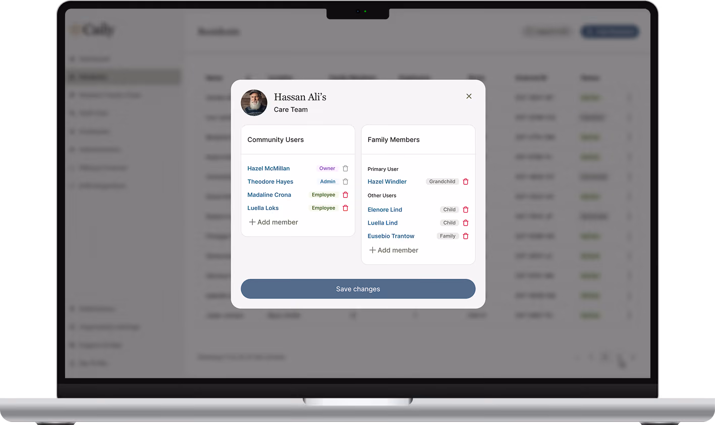Laptop screen displaying a user interface for managing community users and family members under the profile of Hassan Ali from the Care Team, showing names, roles, and options to add or delete members with a 'Save changes' button below.
