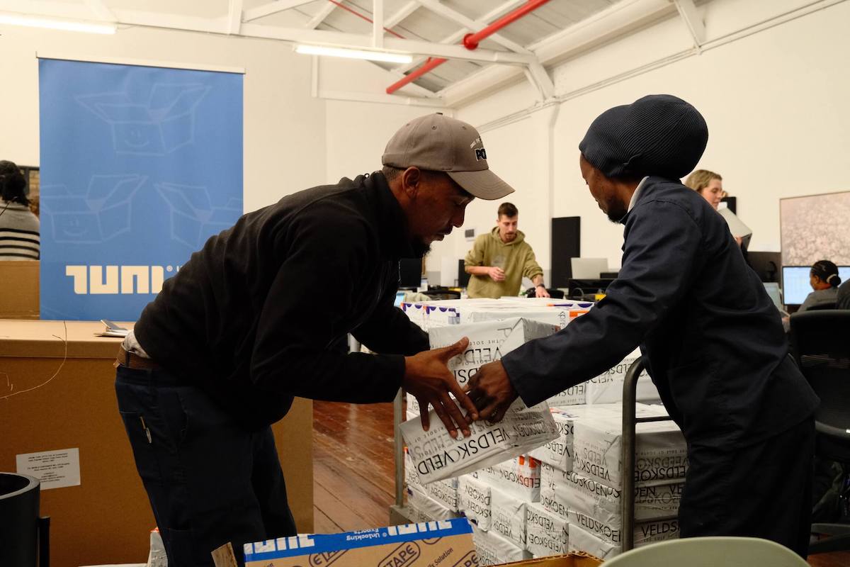 TUNL logistics team working together to move boxes for smooth cross-border ecommerce shipping