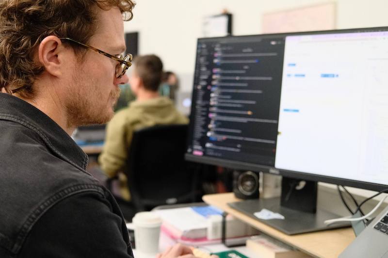 TUNL operations team using digital tools to automate shipping paperwork and logistics processing