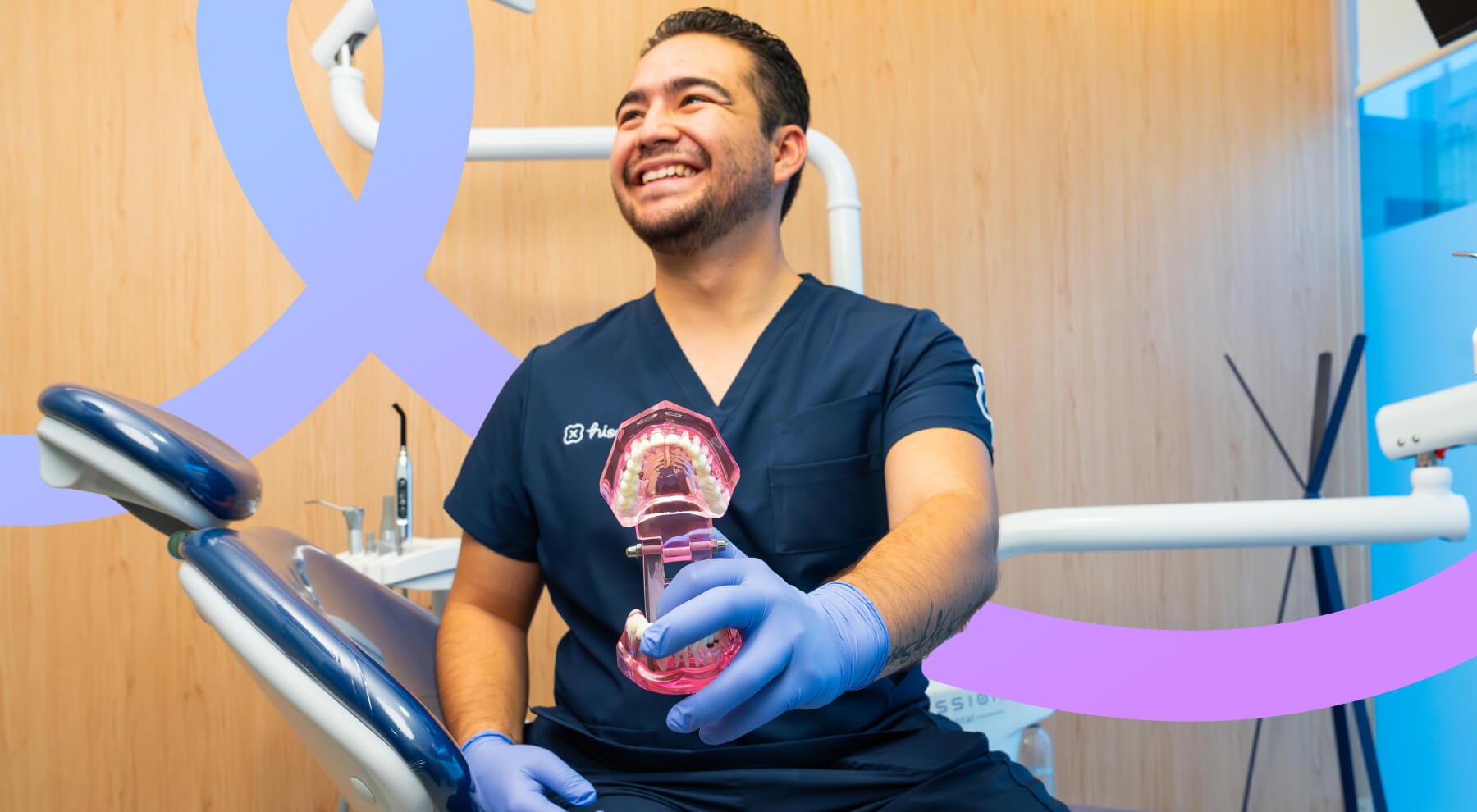 Mexico City dentist showing removable partial denture to patient
