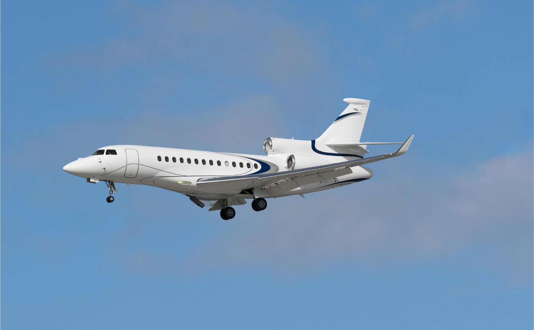Falcon 7X in flight sold by Jetrock