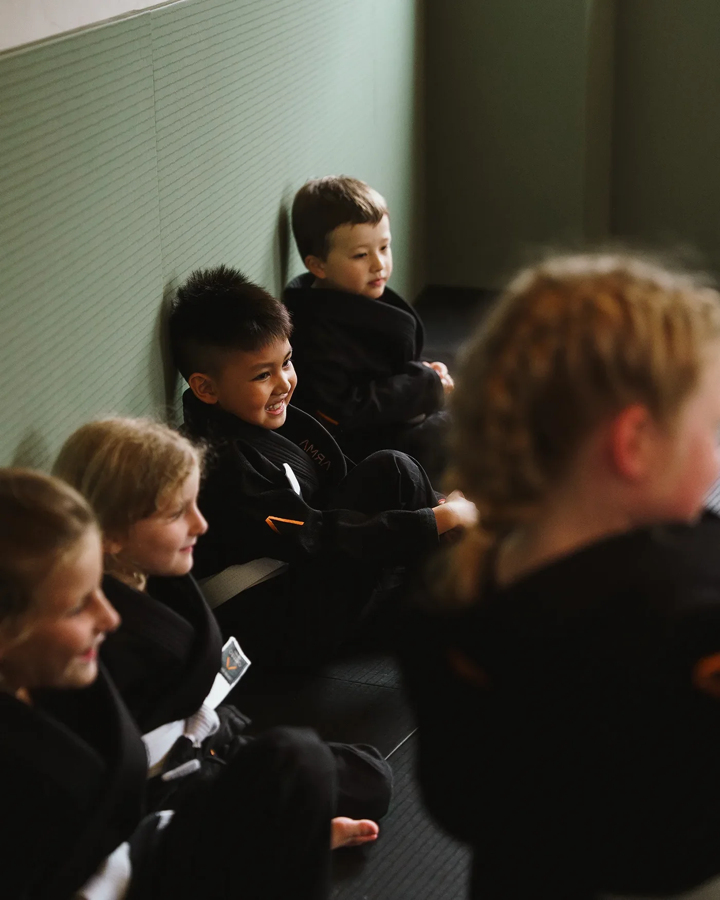 Children studying Brazilian Jiu Jitsu class