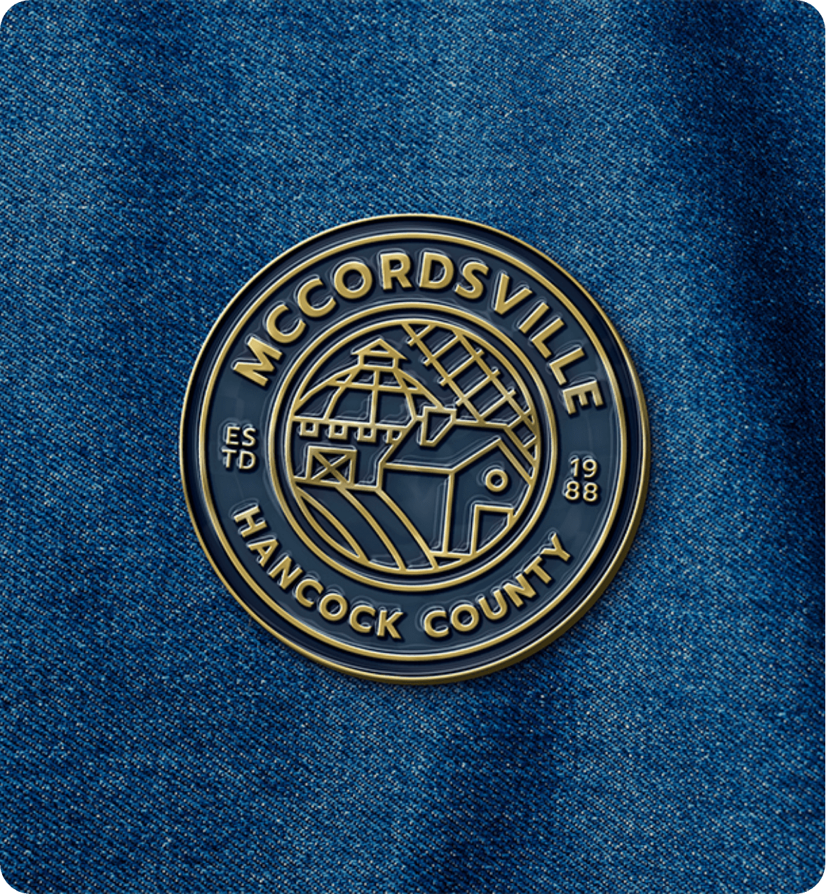 Pin of the new town seal for the Town of McCordsville in Indiana that was designed by AP The Creative. 