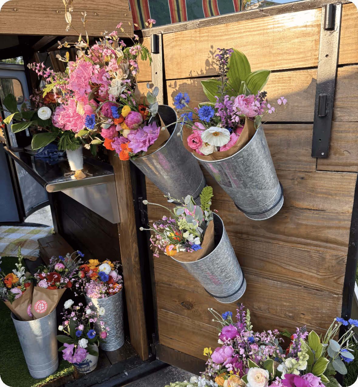 Flower Farm on Redwood Plymouth farmers market set up of bouquets with the branding and logo designed by AP The Creative