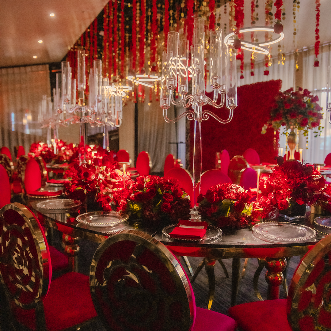 A large private room with a glass wall on an entire side, curtained entrance, a private bar and modern A/V capabilities. The large space makes it ideal for presentations, strolling events & more.