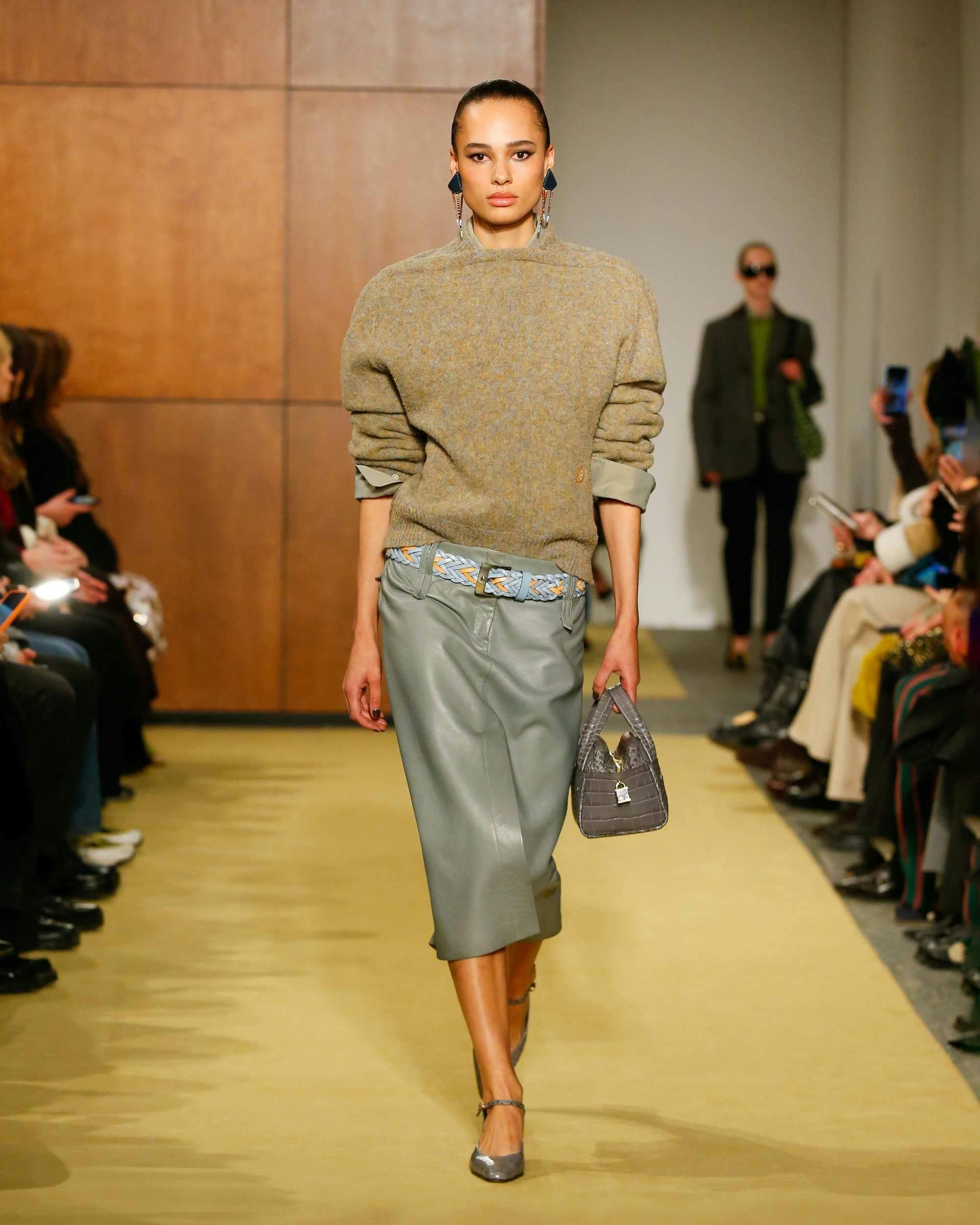 handbag fashion adult male man person pants female woman high heel