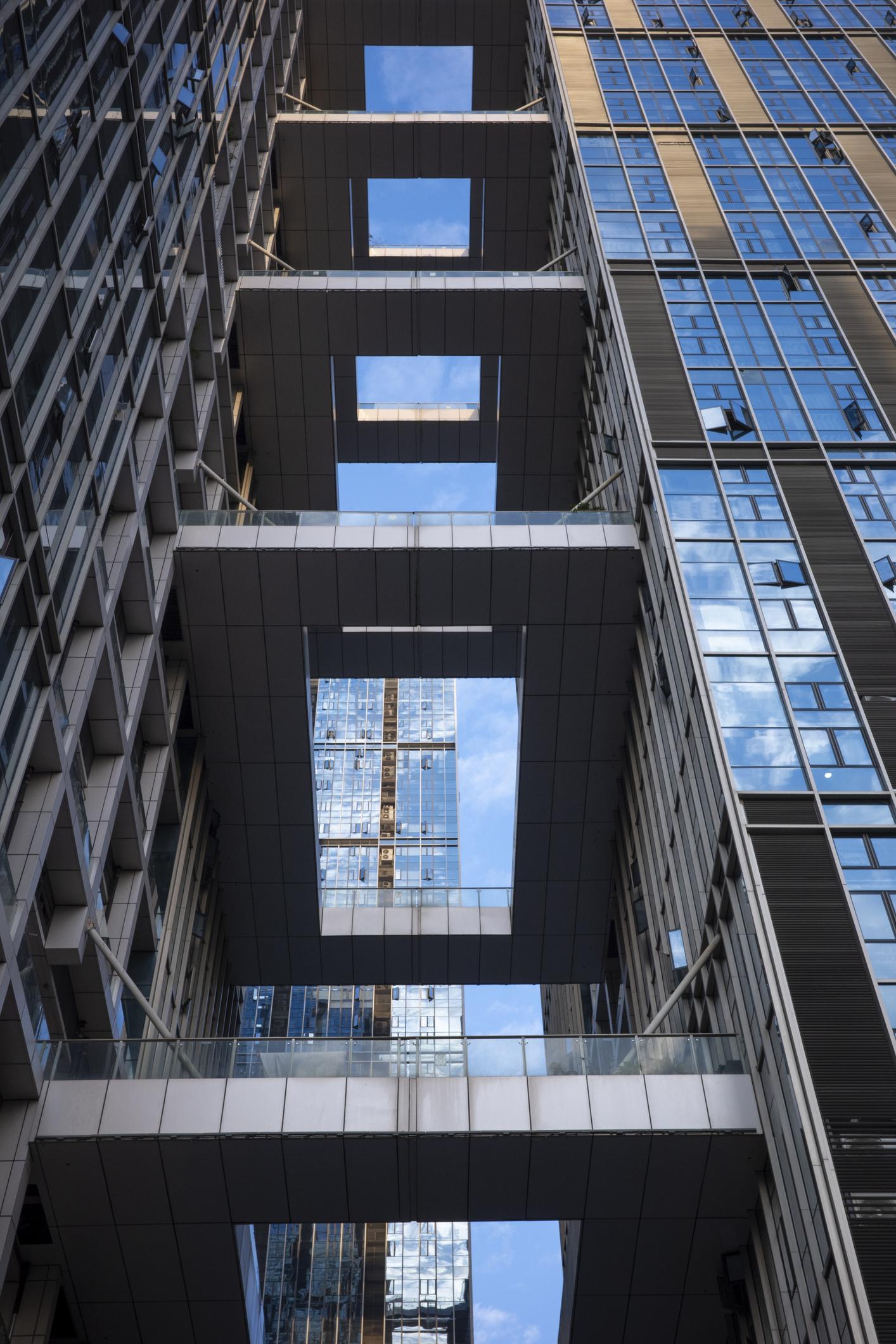 Modern Urban Architecture with Glass Facades and Steel Frameworks