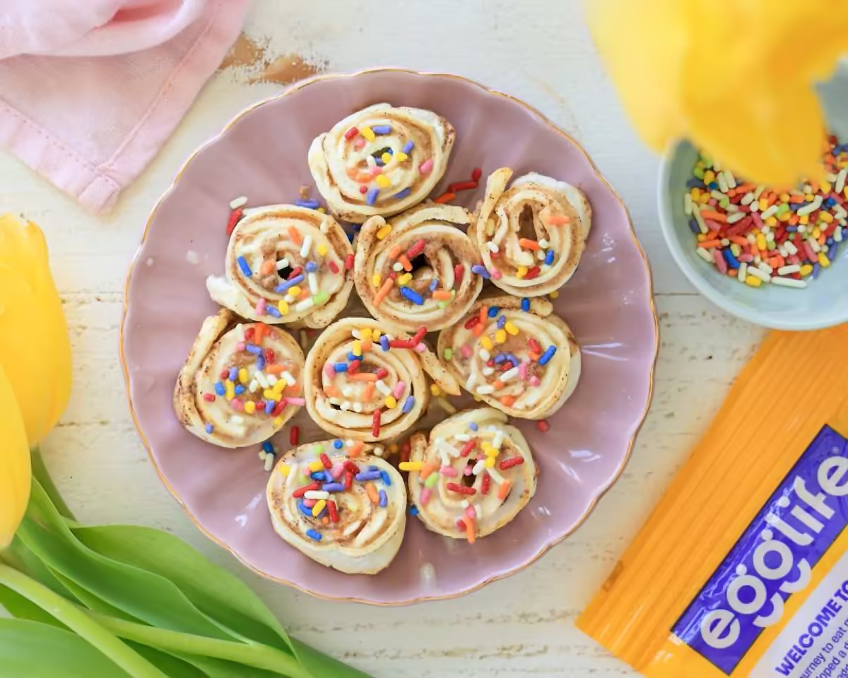 High Protein Mini Cinnamon Rolls with 21 g protein, gluten free. Warm, cinnamon swirled and made with original egglife wraps. These are an easy, high protein, low carb twist on a brunch classic 