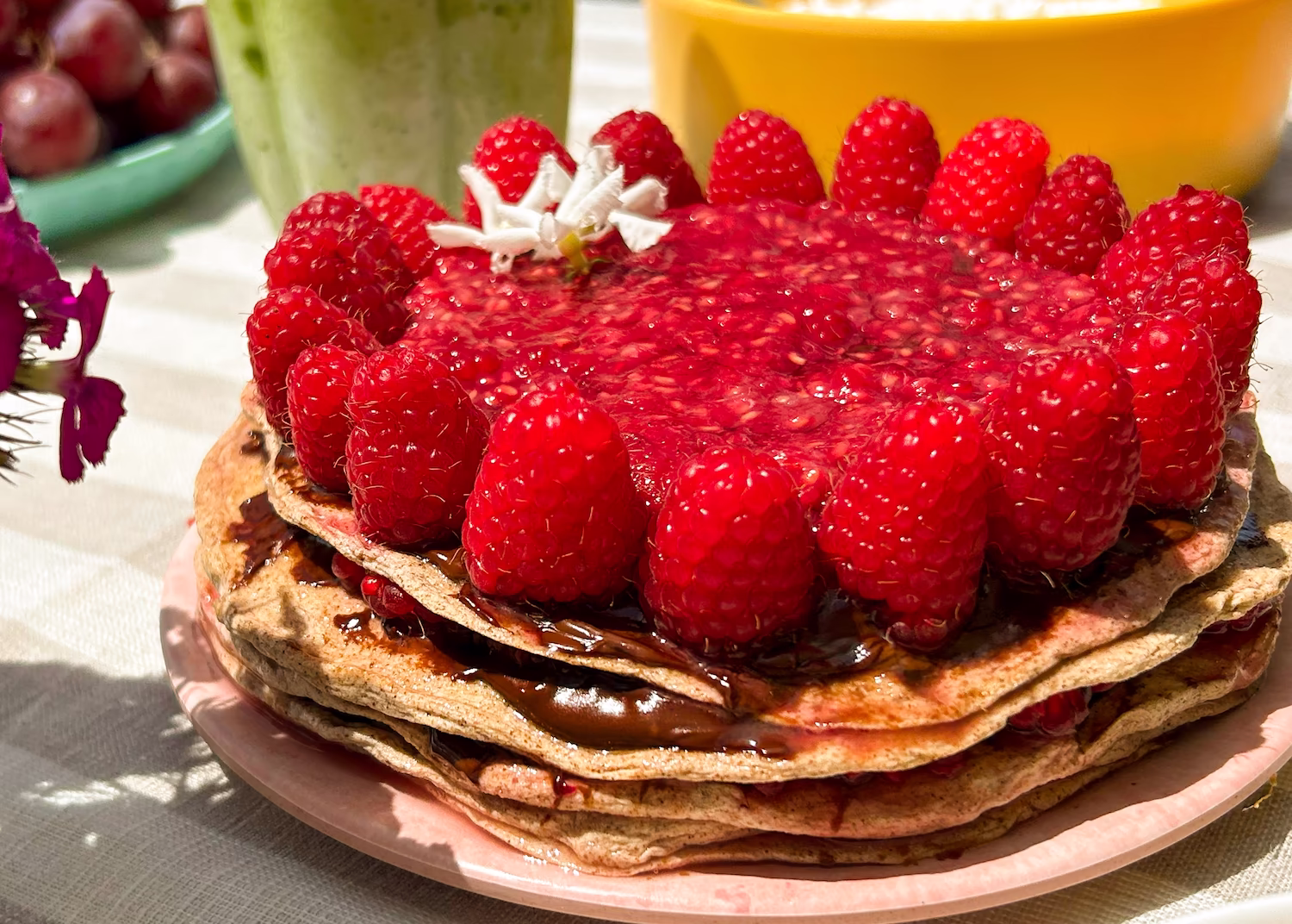 High protein hazelnut spread and raspberry crepe cake made with egg white wraps