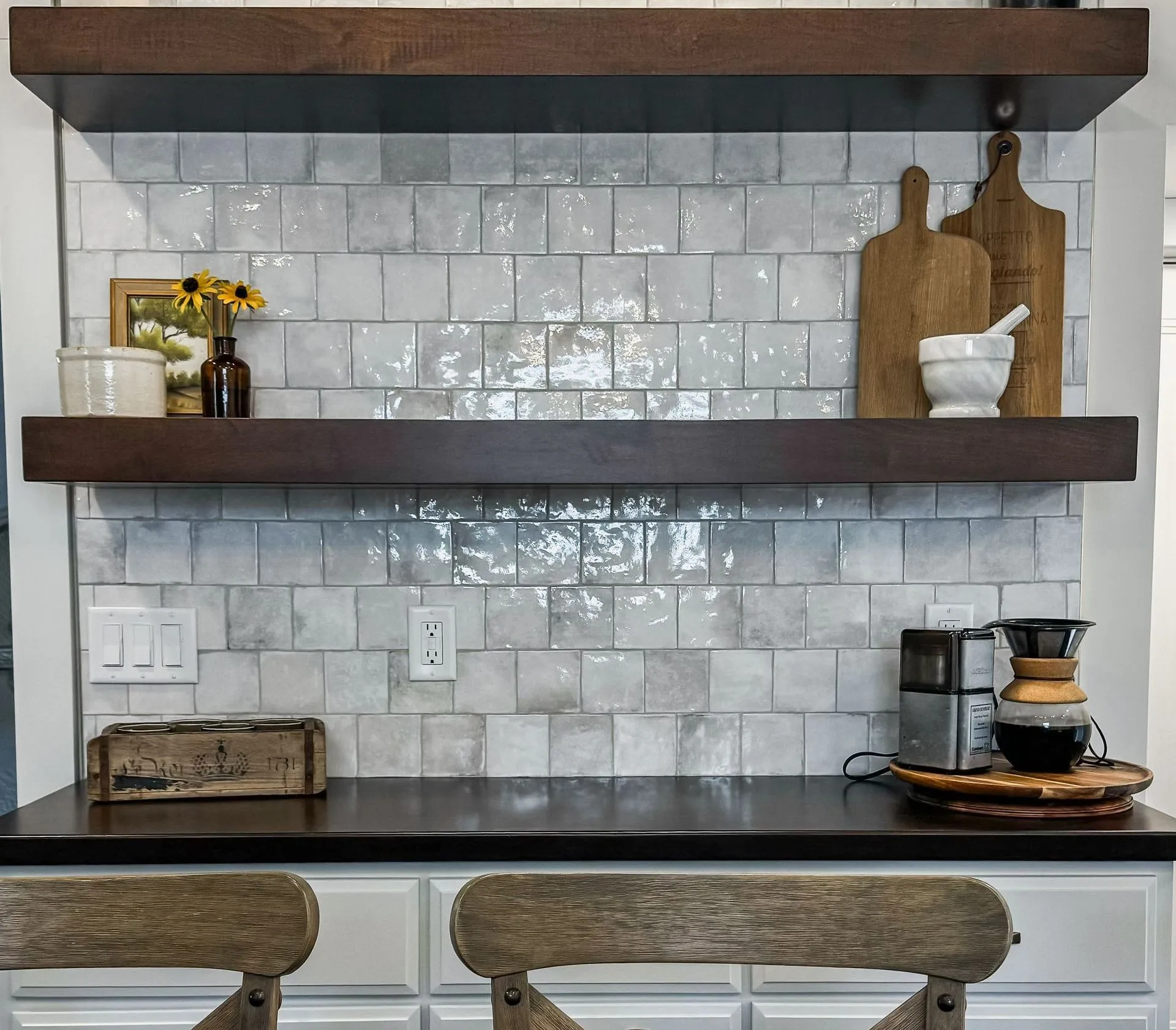 wood shelves with white square tile backsplash