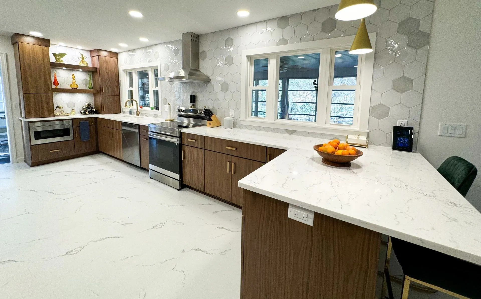 clazak remodeled kitchen wood cabinets with white hexagonal tile backsplash