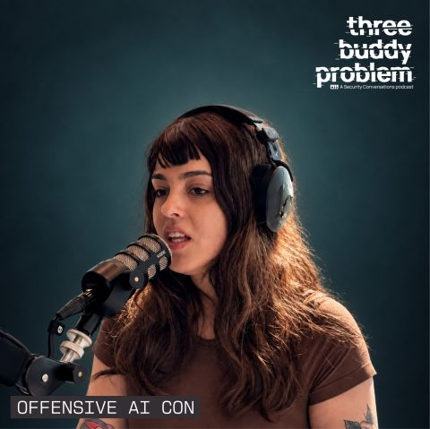 Valentina Palmiotti, known as chompie, speaking into a microphone during Three Buddy Problem at Offensive AI Con 2026
