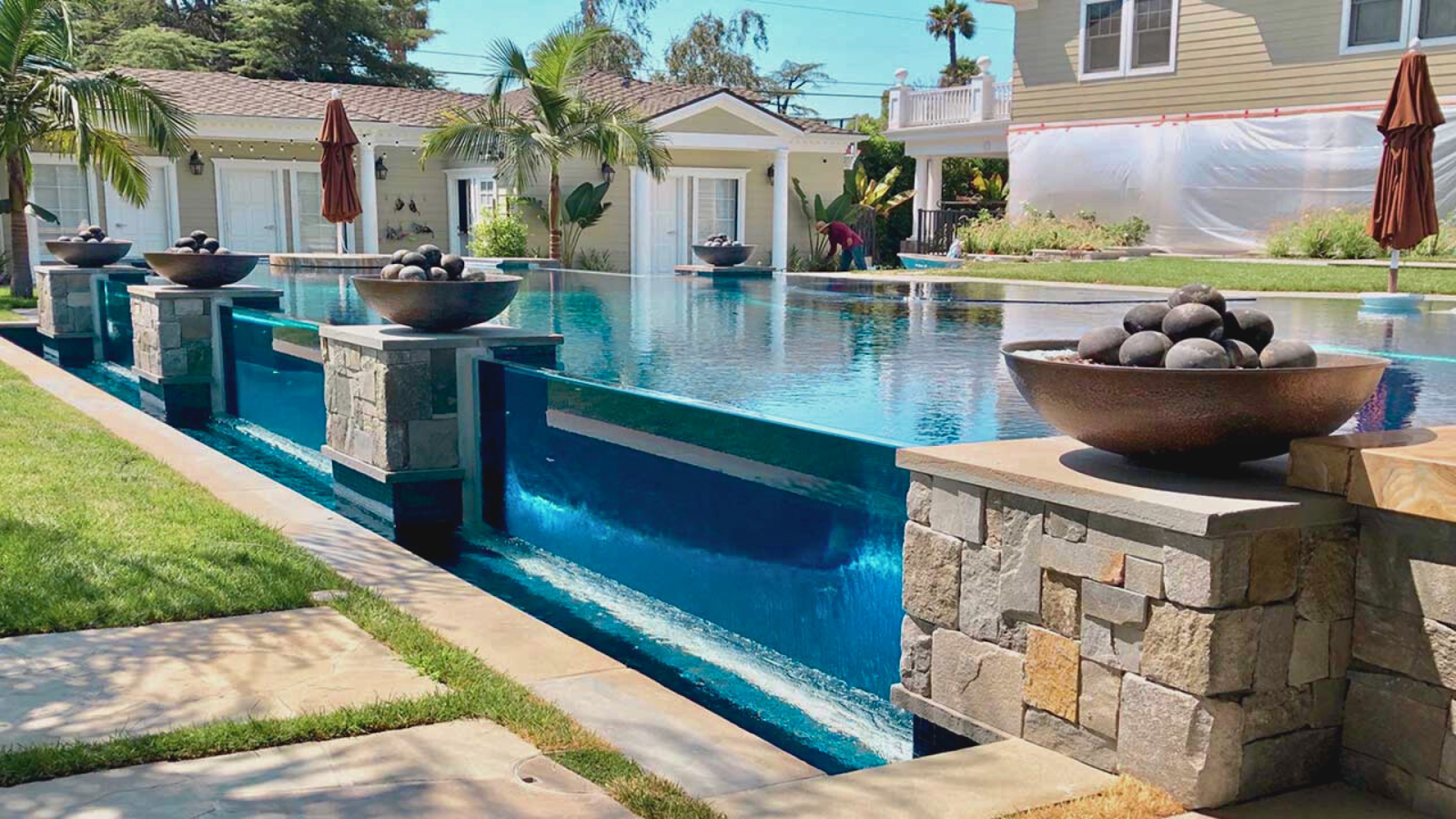 Example of a pool window installed on a side wall for underwater viewing.