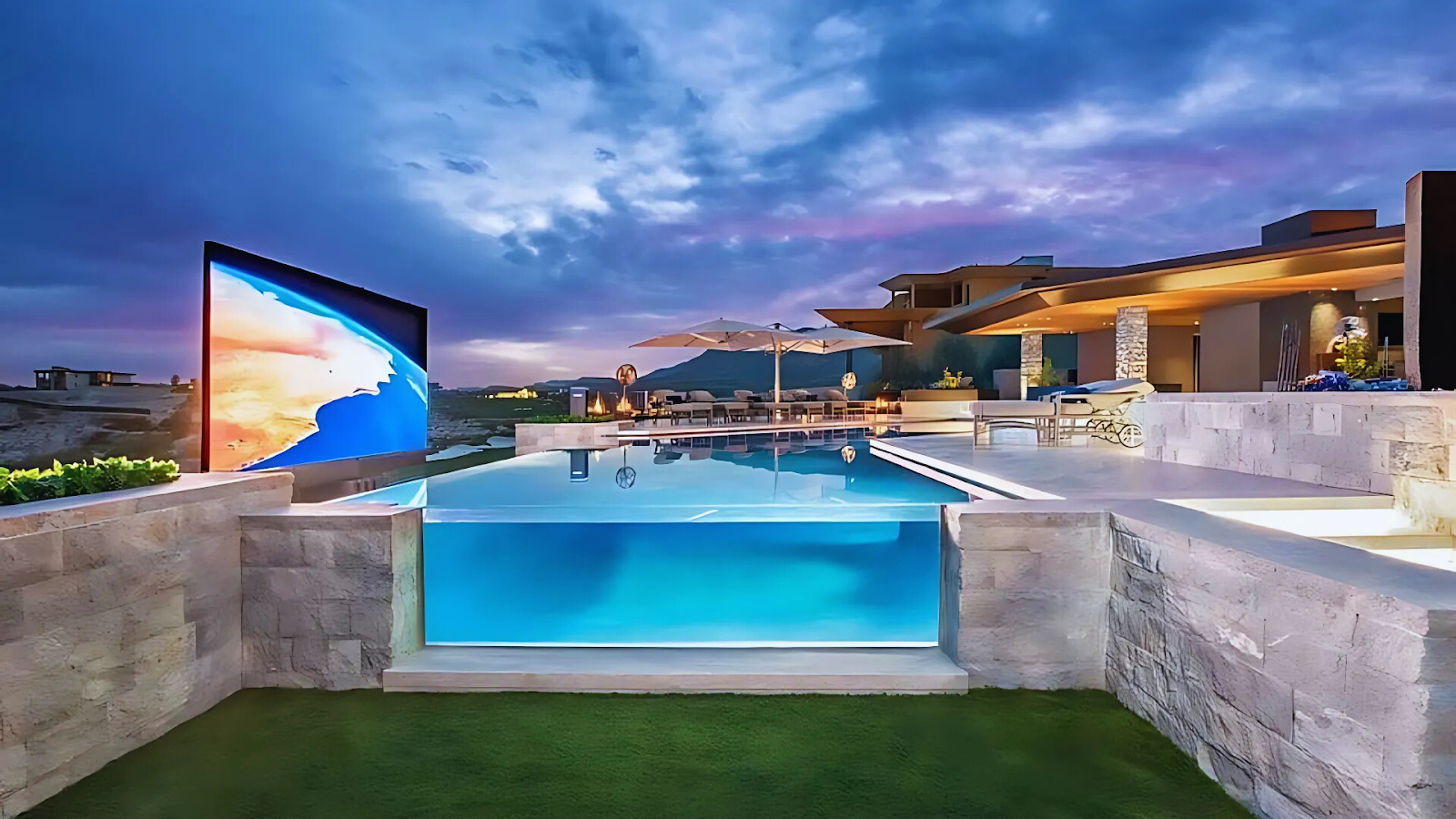 Rooftop pool with an acrylic floor window offering views from below.