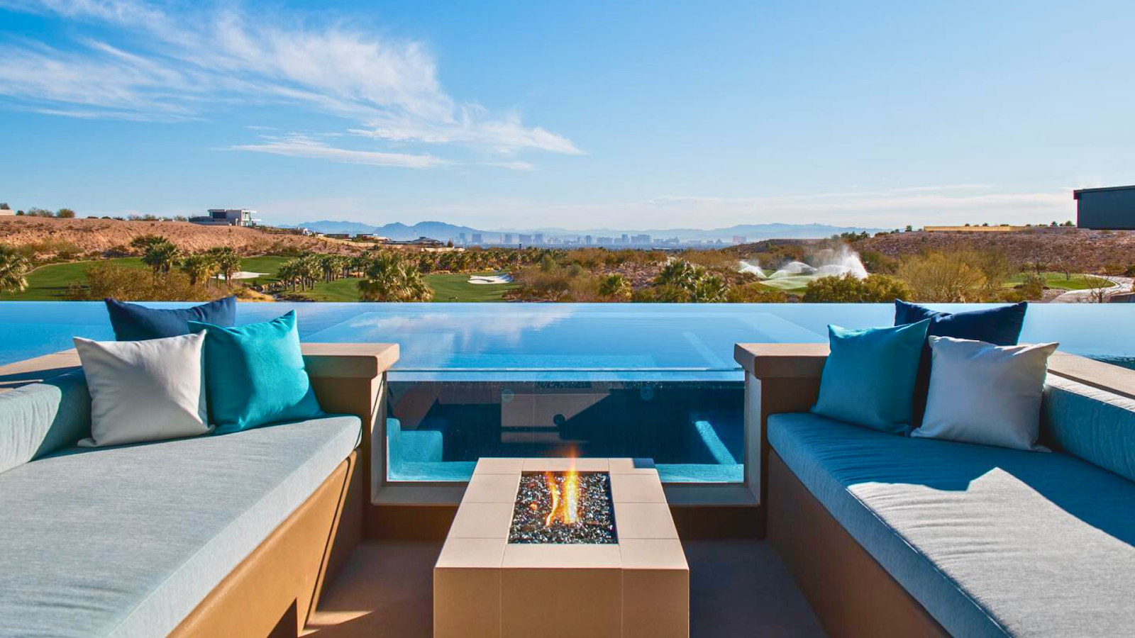 Infinity pool window edge with water spilling over for a horizon effect
