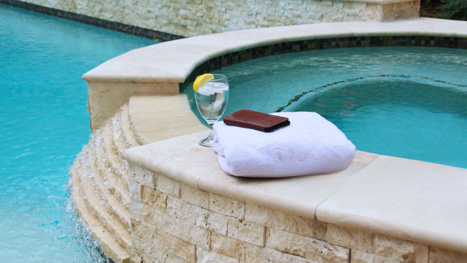 Travertine coping on a rooftop luxury swimming pool