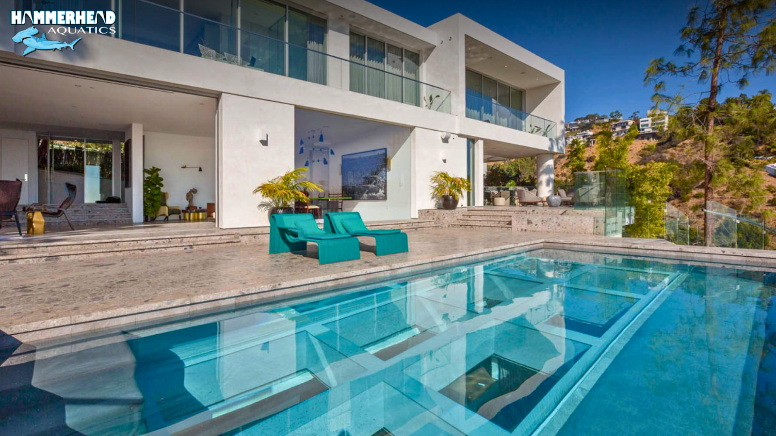 Custom concrete in-ground pool with modern geometric design
