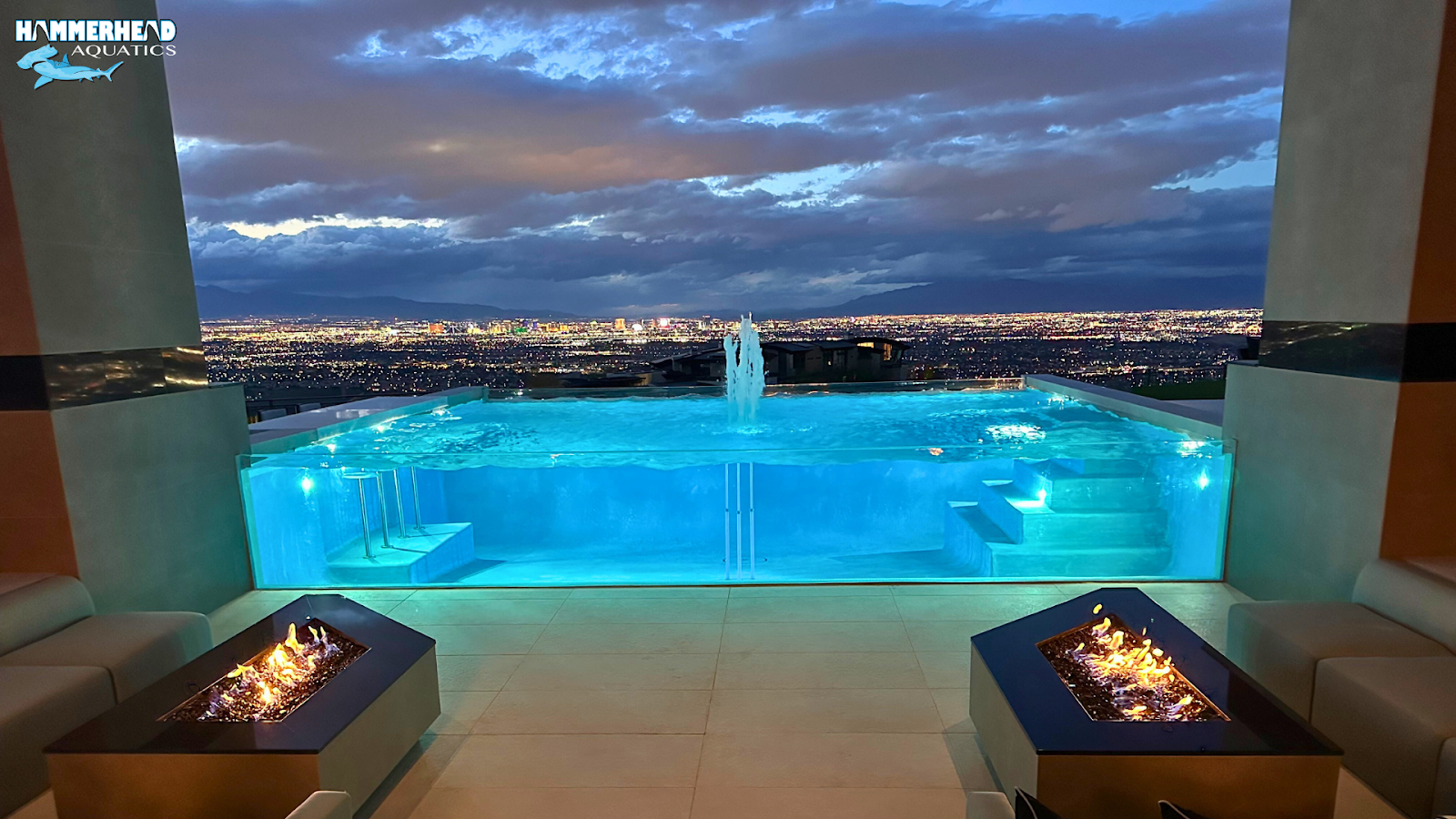 Rooftop infinity pool featuring a clear acrylic edge window