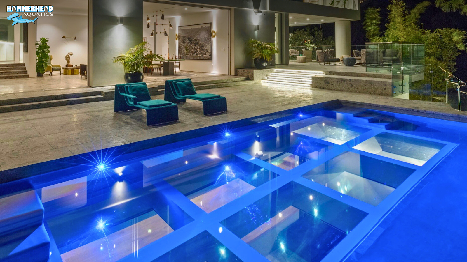 Rooftop swimming pool with underwater viewing window below