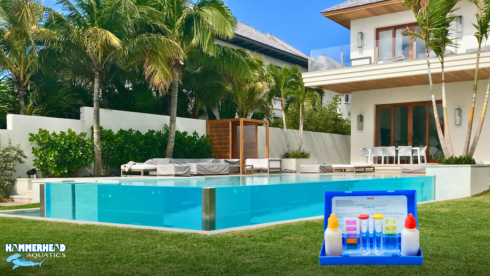 Crystal clear swimming pool with test kit and balanced pool chemicals