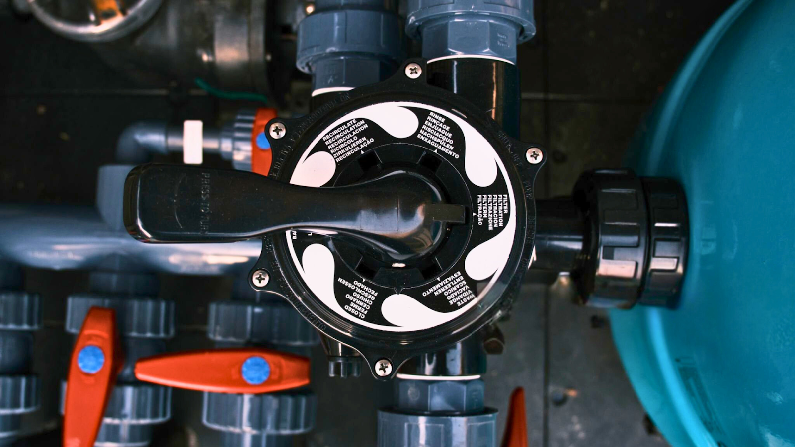 Pool plumbing valves acting as traffic controllers for water flow