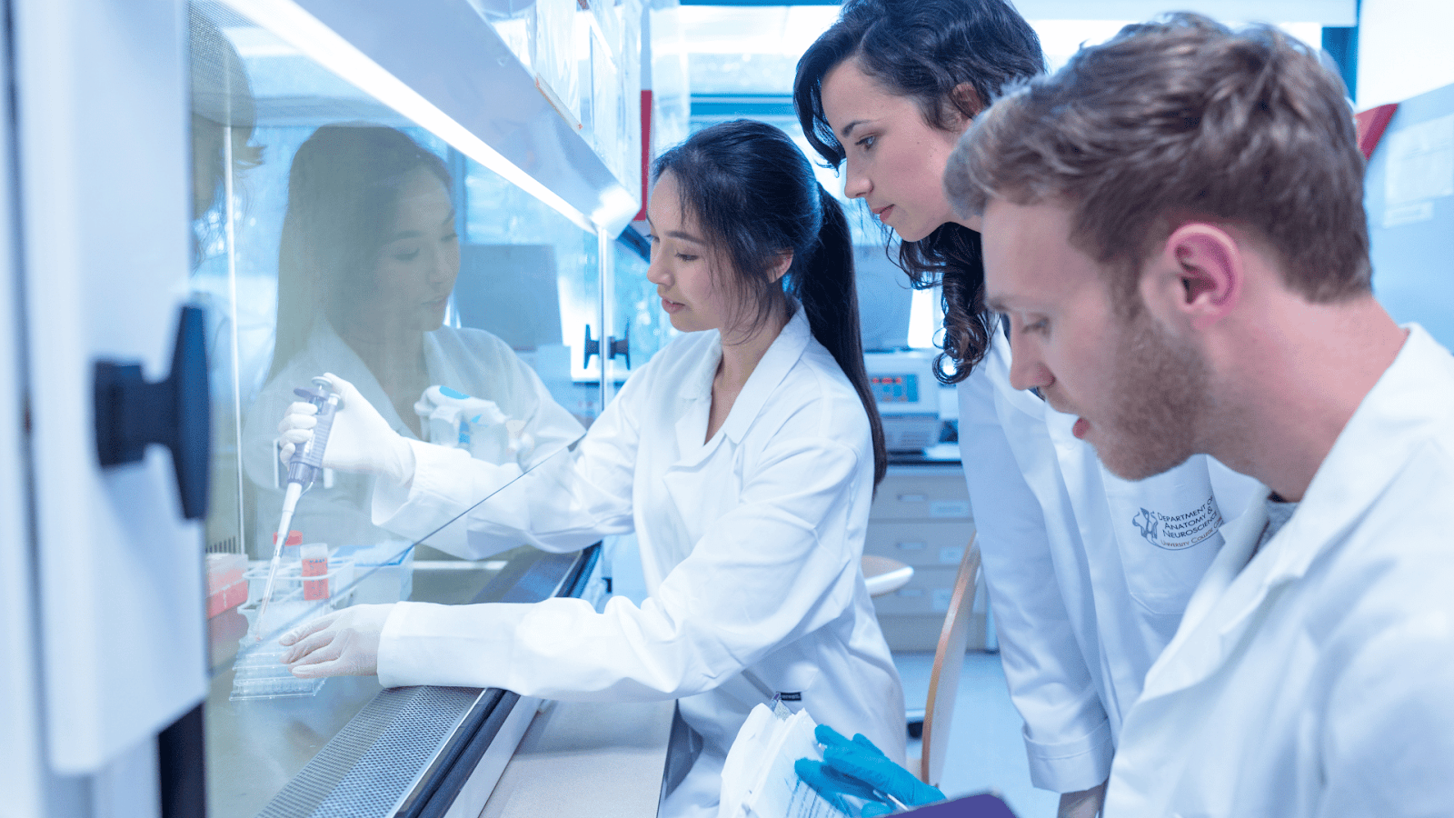 Researchers using underwater windows in a hydrodynamic test tank