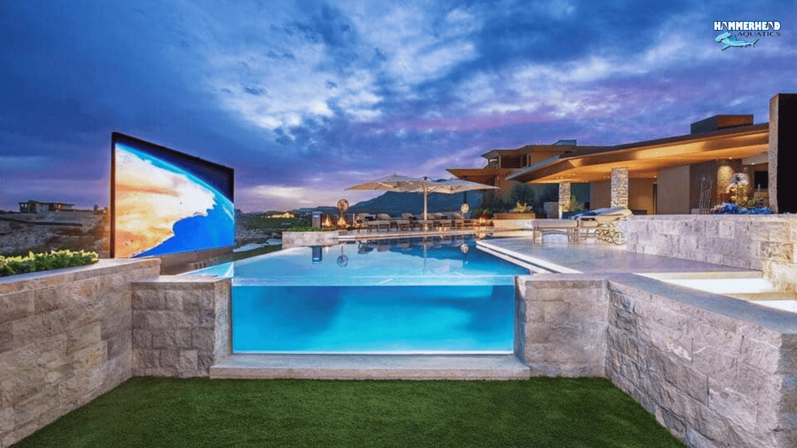 Luxury swimming pool with a waterproof underwater window installed securely.