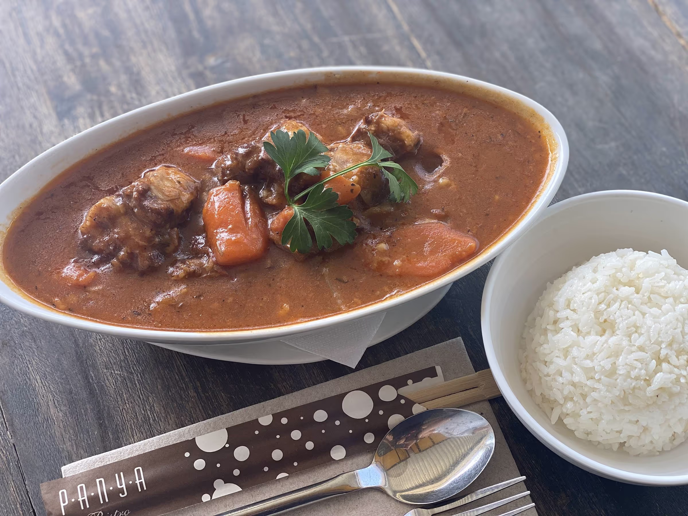Oxtail Stew and a rice side dish.