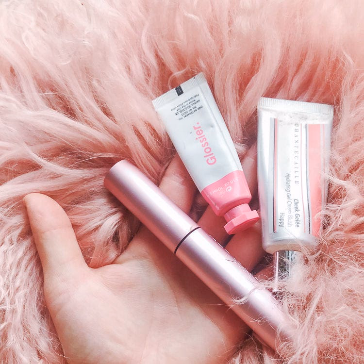pink makeup on hand