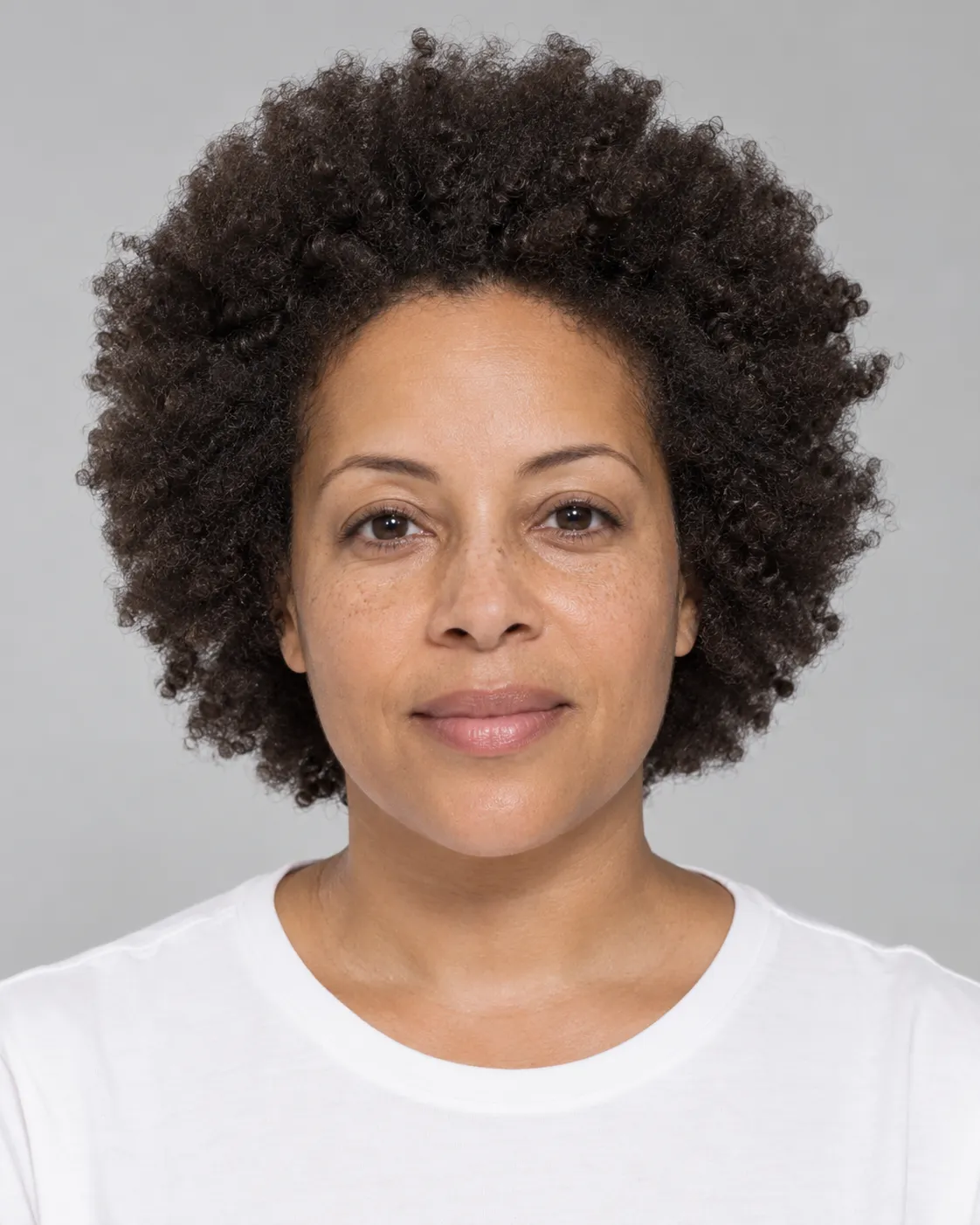 Woman with a soft, fluffy type 4b afro, an example of hair suited to the Crown Ritual Head Spa