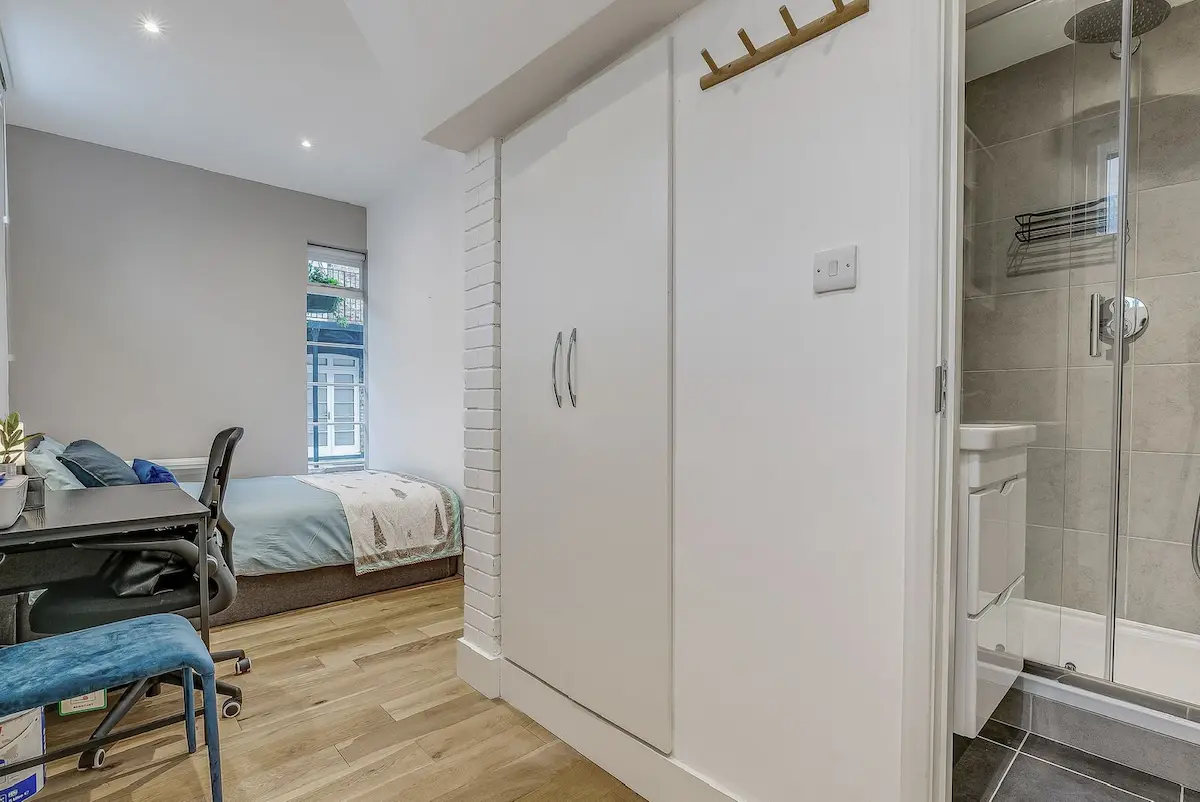 Full view of the open-plan space including kitchen, dining, and living areas