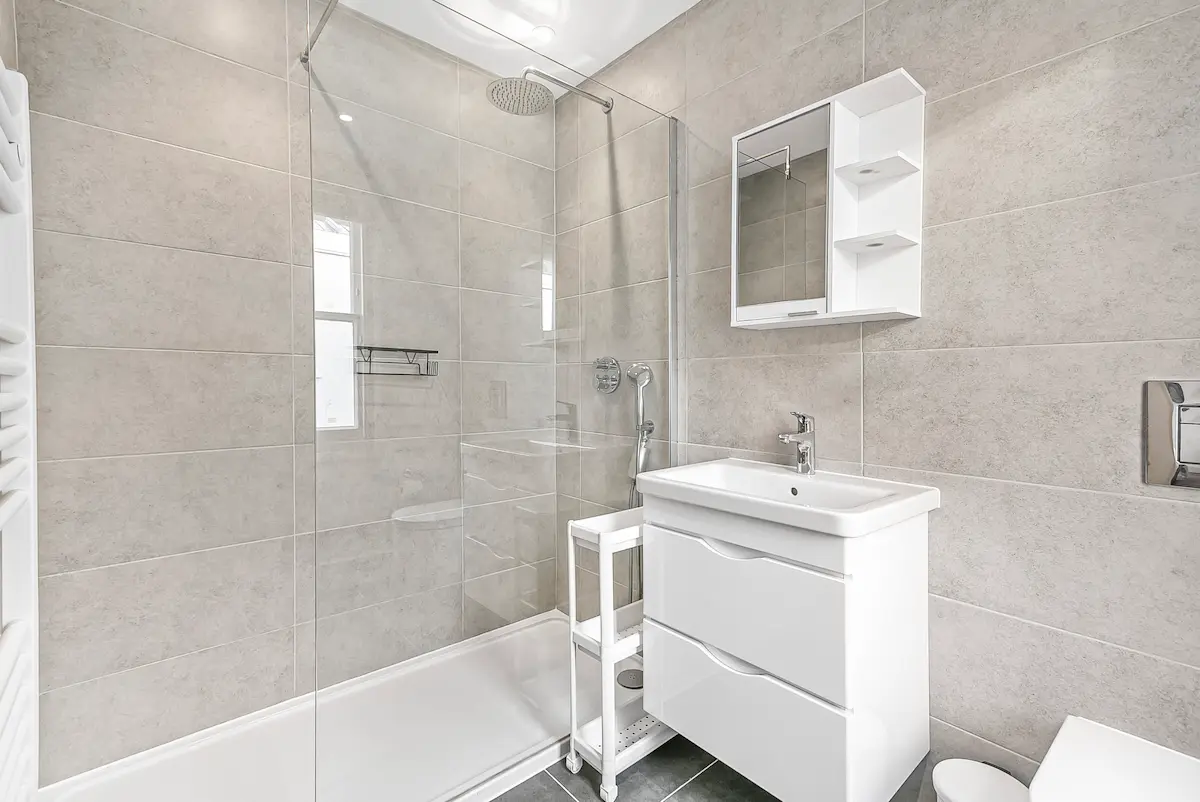 Bathroom featuring elegant lighting and clean modern lines