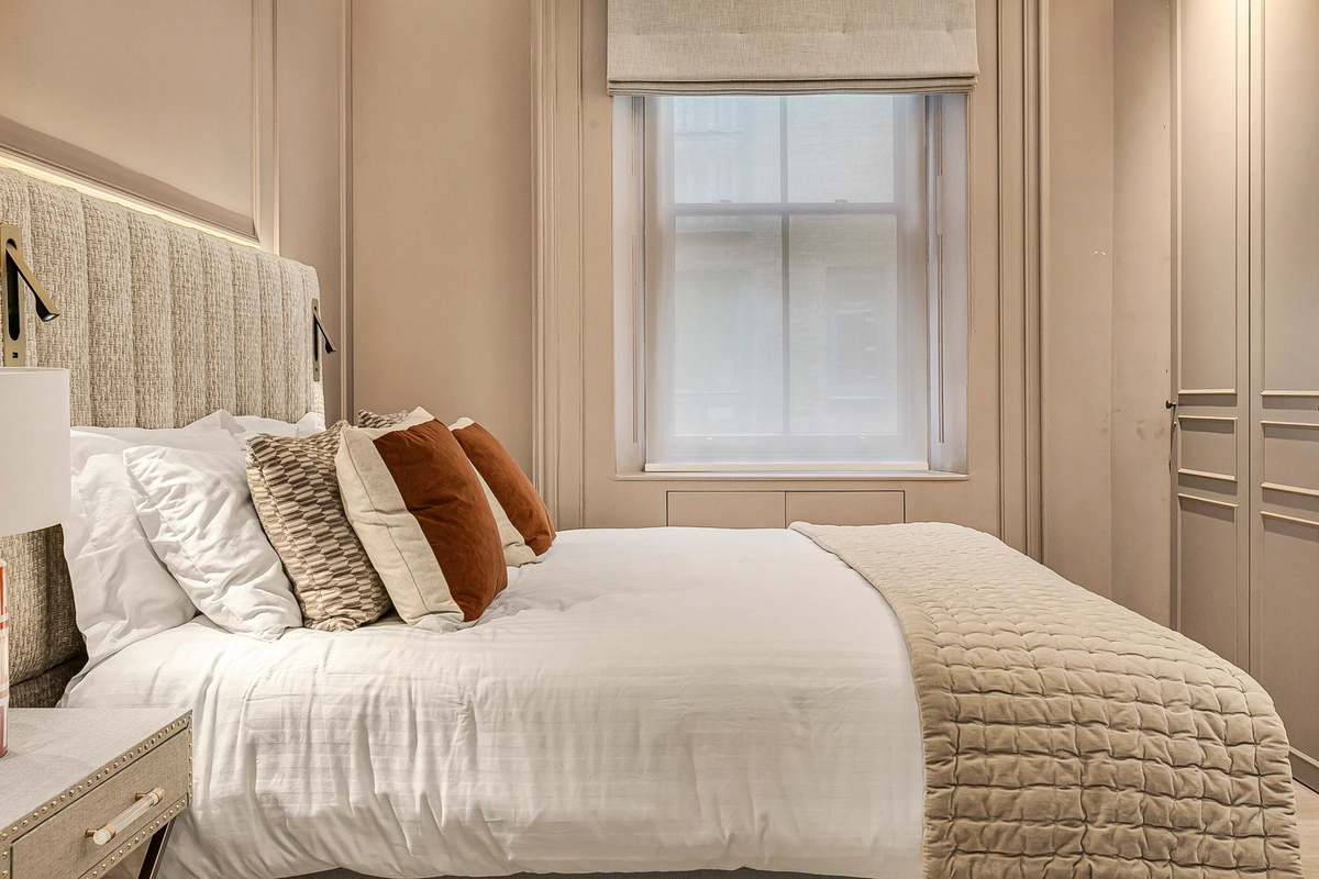 Luxurious bedroom with a super king-sized bed and soft neutral tones