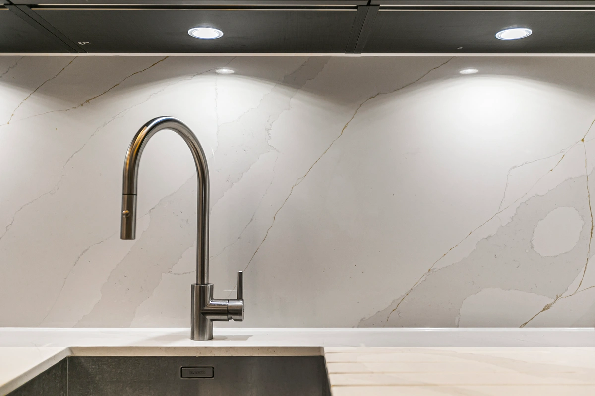State-of-the-art kitchen with marble countertops and high-end appliances