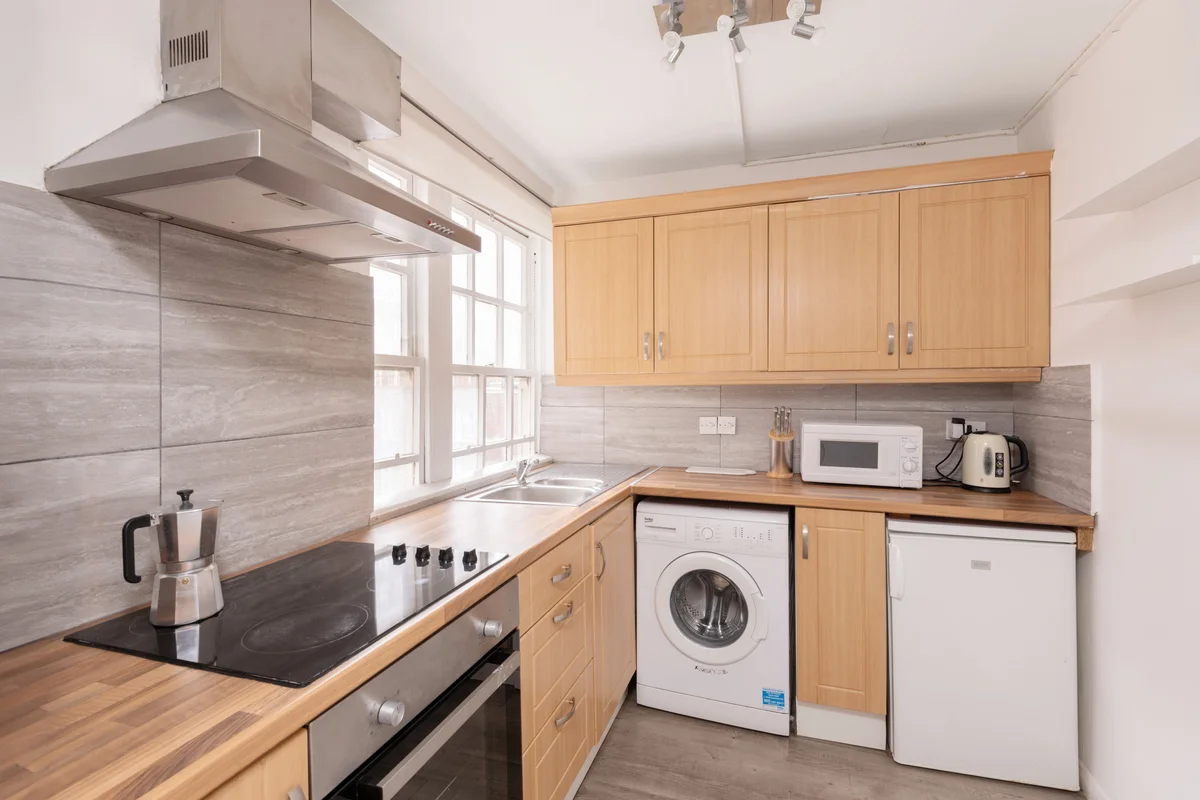 Kitchen space with ample counter area and built-in appliances
