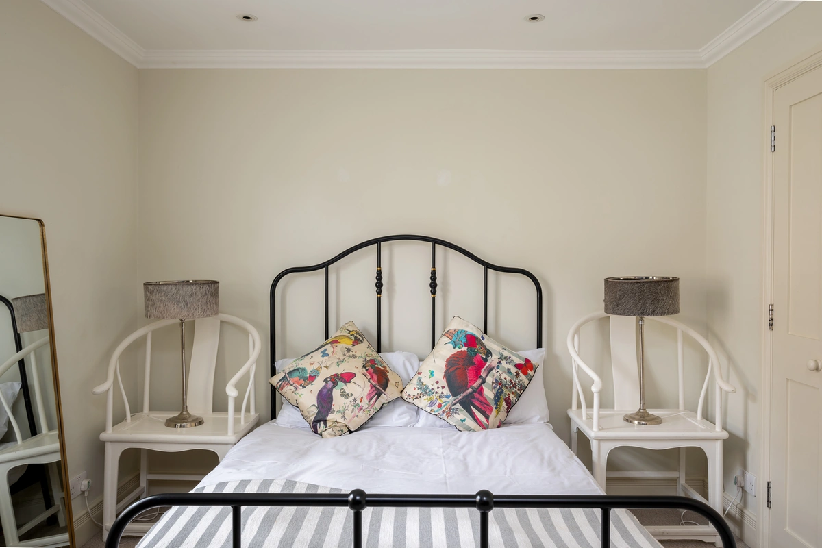 Second bedroom with classic decor and comfortable double bed