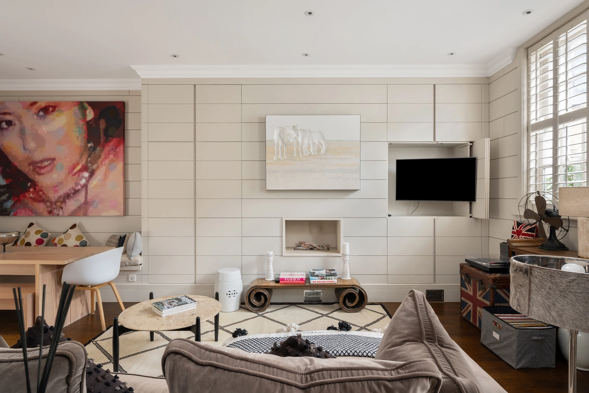 Charming living room with classic British decor and natural light