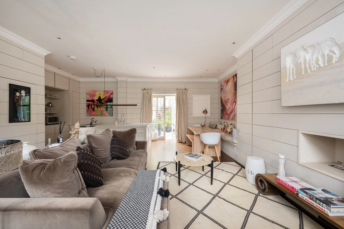 Second cozy lounge with elegant furnishings and fireplace